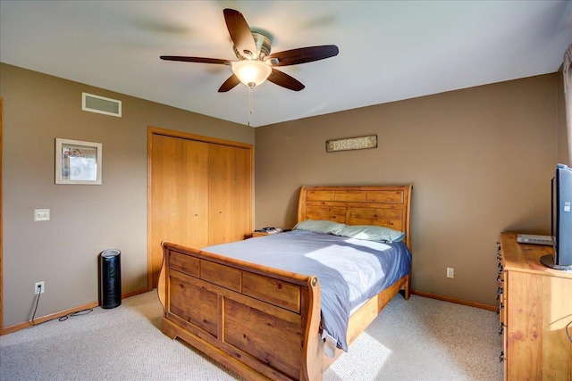 182 Ames St, Oregon, WI 53575 - bedroom featuring light colored carpet, a closet, baseboards, and ceiling fan