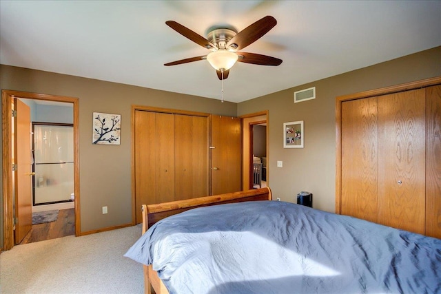 182 Ames St, Oregon, WI 53575 - carpeted bedroom with multiple closets, connected bathroom, baseboards, and ceiling fan