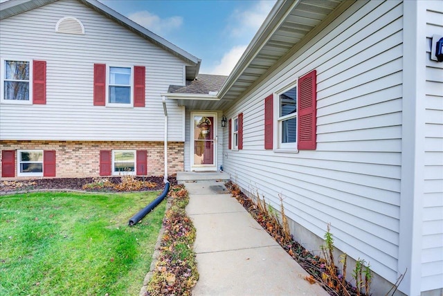 182 Ames St, Oregon, WI 53575 - property entrance featuring a yard