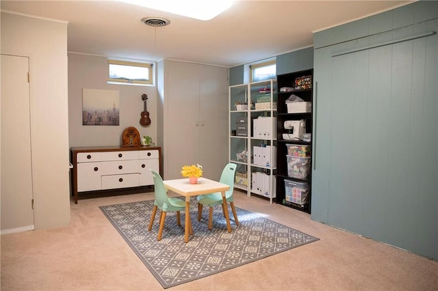 2702 Clark Pl, Eau Claire, WI 54701 - dining area featuring light carpet and plenty of natural light