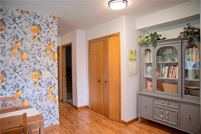 2702 Clark Pl, Eau Claire, WI 54701 - hallway featuring wood finished floors and baseboards
