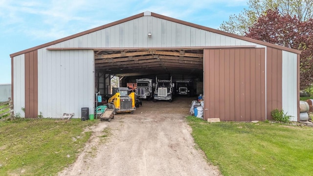 W8749 Hunters Rd, Hortonville, WI 54944 - view of pole building with a lawn and driveway