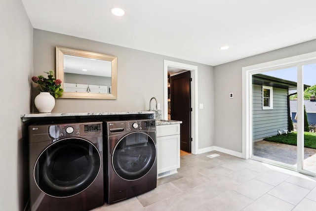 6020 Briarclift Ct, Greendale, WI 53129 - laundry room featuring washer and clothes dryer, cabinet space, light tile patterned floors, recessed lighting, and baseboards