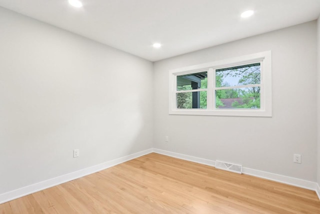 6020 Briarclift Ct, Greendale, WI 53129 - empty room with baseboards, light wood-style floors, and recessed lighting