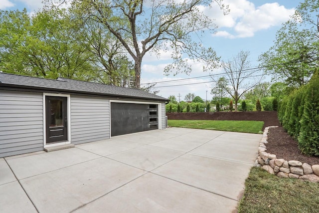 6020 Briarclift Ct, Greendale, WI 53129 - view of patio featuring a garage