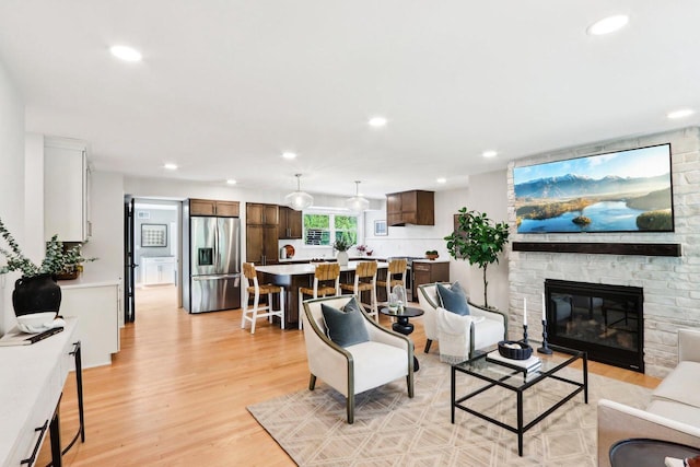 6020 Briarclift Ct, Greendale, WI 53129 - living area with recessed lighting, light wood-style floors, and a fireplace