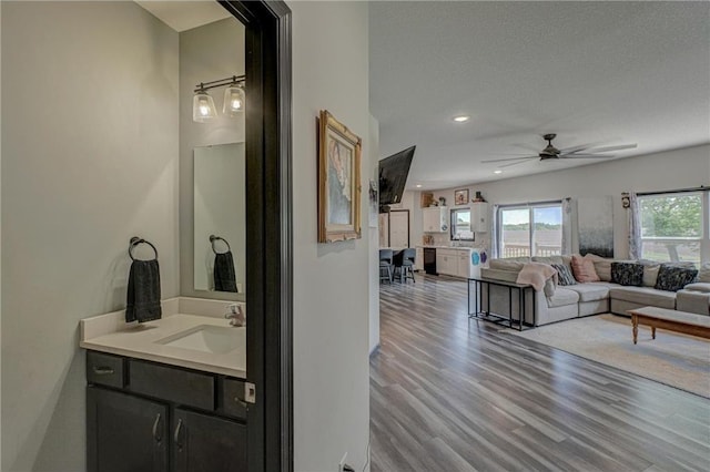 17690 Clayton Ave, Rosemount, MN 55068 - living area with wood finished floors, a ceiling fan, and recessed lighting