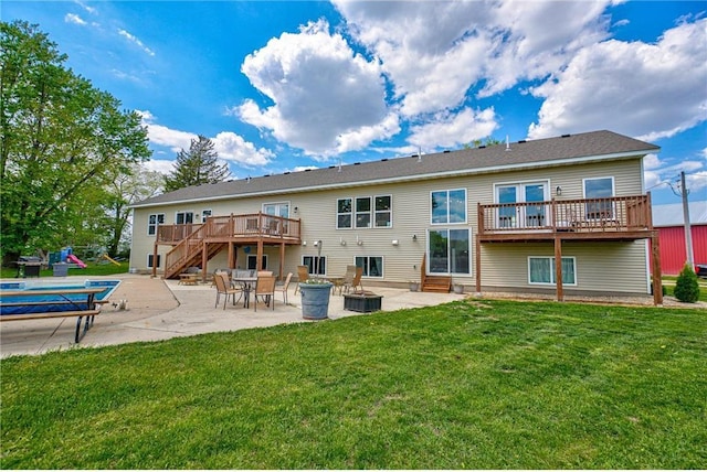 17690 Clayton Ave, Rosemount, MN 55068 - rear view of house with a deck, a patio, stairway, and a yard