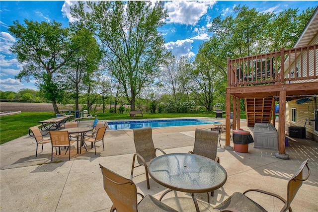 17690 Clayton Ave, Rosemount, MN 55068 - outdoor pool with a deck, a patio, outdoor dining area, and a lawn