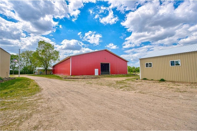 17690 Clayton Ave, Rosemount, MN 55068 - view of pole building featuring driveway