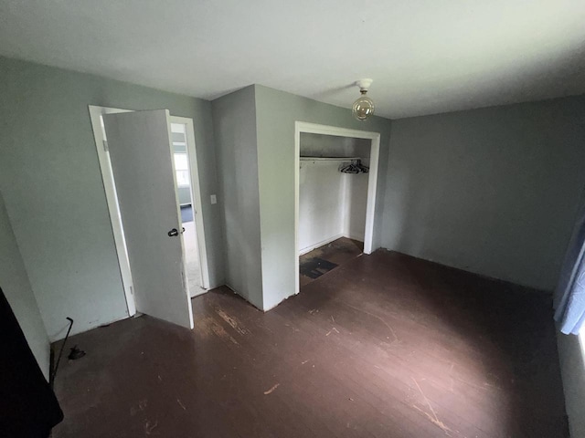 30728 113th St, Wilmot, WI 53181 - unfurnished bedroom featuring a closet and wood finished floors