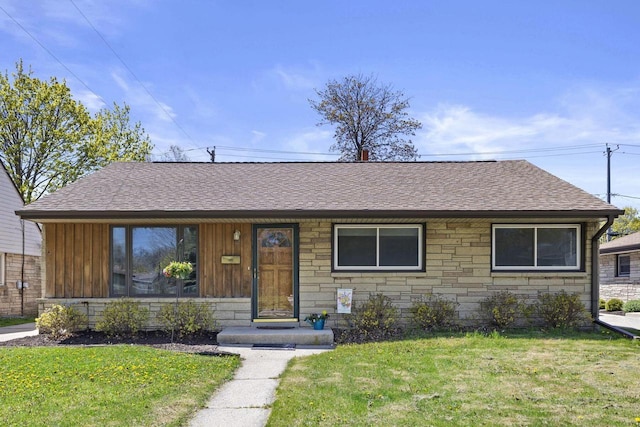 4415 S 5th St, Milwaukee, WI 53207 - view of front of property with stone siding, roof with shingles, and a front yard