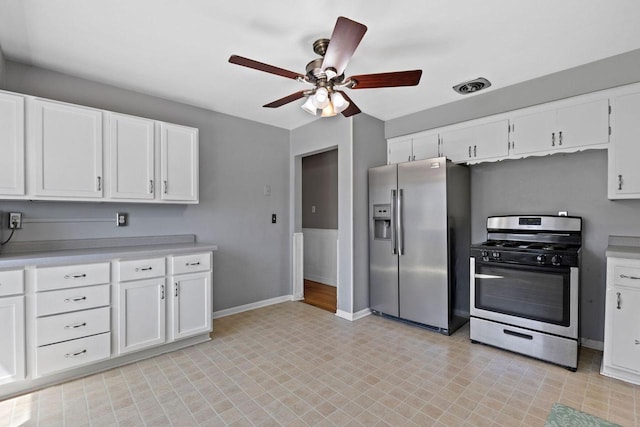 4415 S 5th St, Milwaukee, WI 53207 - kitchen featuring appliances with stainless steel finishes, ceiling fan, light countertops, and white cabinets
