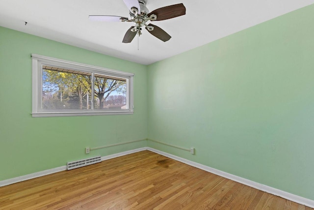 4415 S 5th St, Milwaukee, WI 53207 - spare room featuring baseboards, wood finished floors, and ceiling fan