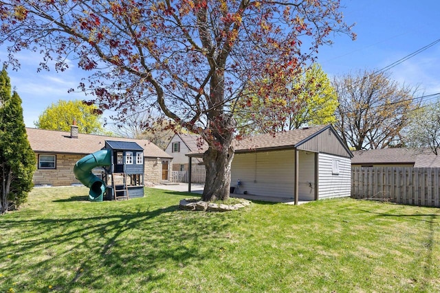 4415 S 5th St, Milwaukee, WI 53207 - rear view of property with a playground