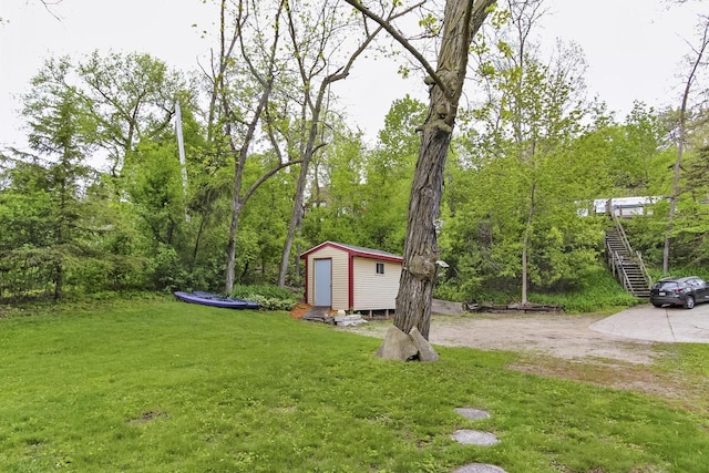 N7428 County Road J, Plymouth, WI 53073 - view of grassy yard featuring stairs