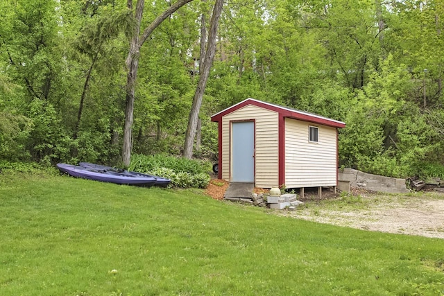N7428 County Road J, Plymouth, WI 53073 - view of shed featuring a forest view