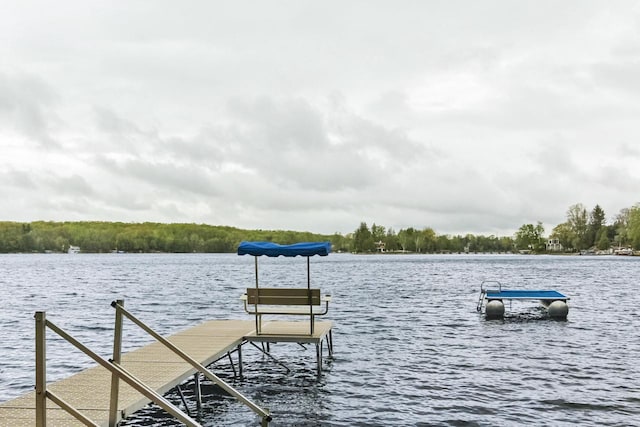 N7428 County Road J, Plymouth, WI 53073 - dock featuring a water view