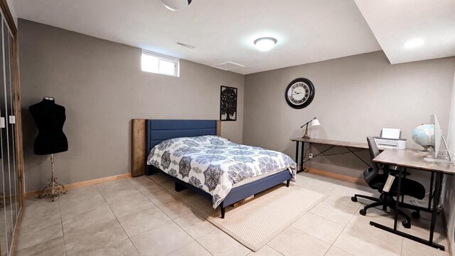 W11202 Apache Rd, Plainfield, WI 54966 - bedroom with light tile patterned flooring, a desk, and baseboards