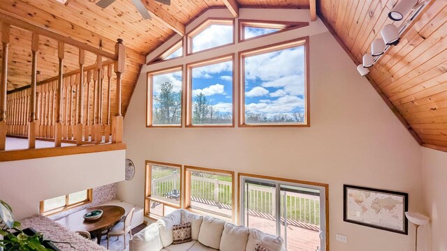 W11202 Apache Rd, Plainfield, WI 54966 - living area with wooden ceiling, ceiling fan, and high vaulted ceiling
