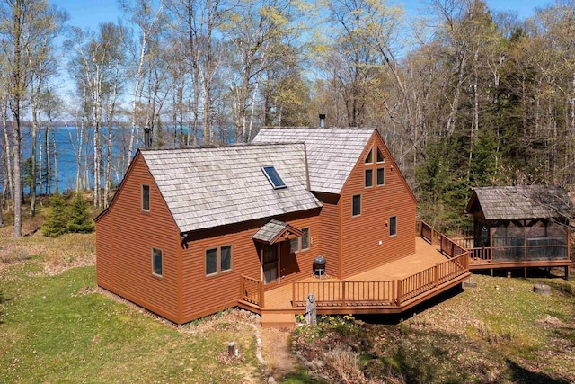 3610 N Shore Rd, La Pointe, WI 54850 - rear view of property featuring a wooden deck and a yard