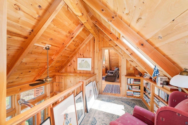 3610 N Shore Rd, La Pointe, WI 54850 - living area featuring wooden ceiling, wood walls, and a ceiling fan