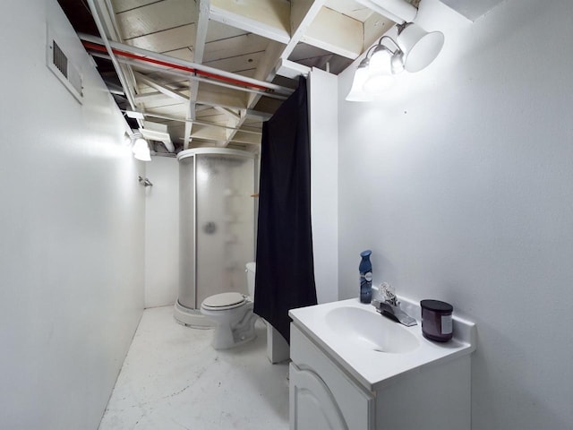 644 S 94th St, West Allis, WI 53214 - bathroom featuring a stall shower, concrete flooring, toilet, and vanity