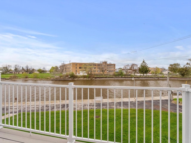 balcony featuring a water view
