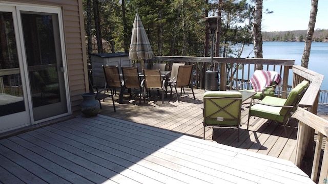 65485 Millicent Point Dr, Iron River, WI 54847 - deck with a water view and outdoor dining area