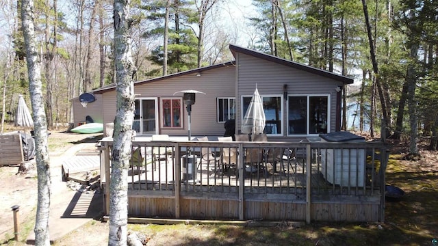65485 Millicent Point Dr, Iron River, WI 54847 - rear view of house with a deck and cooling unit