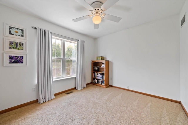 1755 Laura Ln, Port Washington, WI 53074 - spare room with light carpet, a ceiling fan, and baseboards