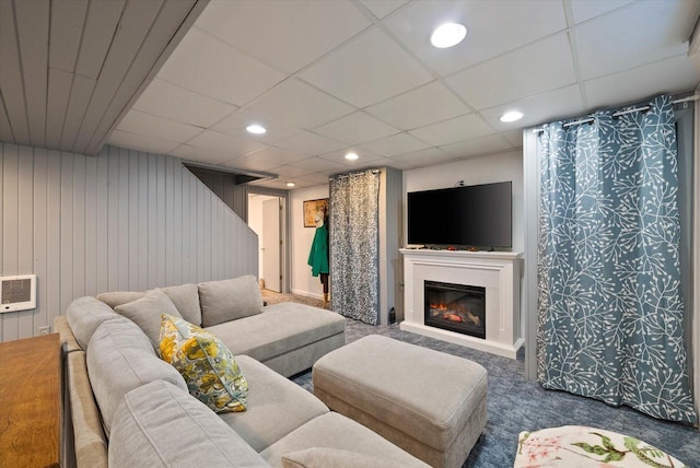 1755 Laura Ln, Port Washington, WI 53074 - carpeted living area featuring a glass covered fireplace, recessed lighting, a wall mounted air conditioner, and a drop ceiling