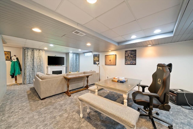 1755 Laura Ln, Port Washington, WI 53074 - living room featuring carpet floors, a fireplace, a paneled ceiling, and recessed lighting
