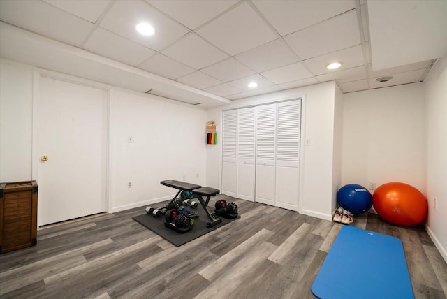 1755 Laura Ln, Port Washington, WI 53074 - workout room featuring wood finished floors, a drop ceiling, baseboards, and recessed lighting