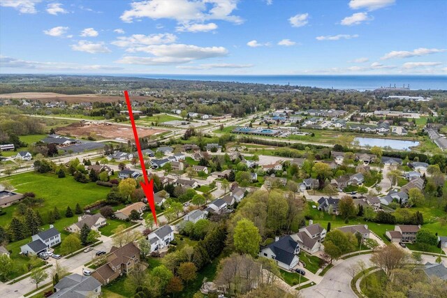 1755 Laura Ln, Port Washington, WI 53074 - aerial view of property and surrounding area with a nearby body of water and nearby suburban area