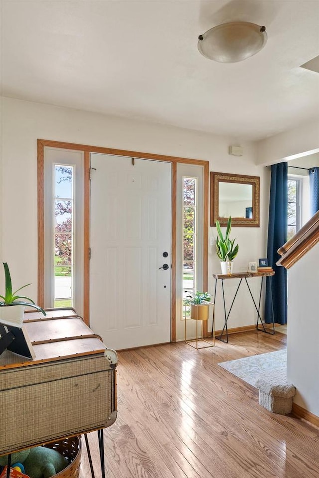 1755 Laura Ln, Port Washington, WI 53074 - entrance foyer featuring light wood-type flooring and baseboards