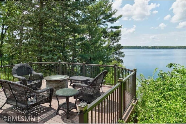 802 Flos Ct, Amery, WI 54001 - wooden deck with a water view