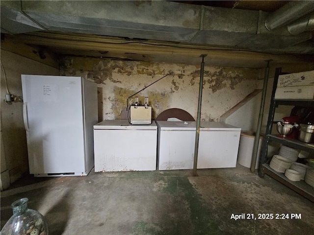 23716 Washington St # 1/ # 2, Independence, WI 54747 - below grade area featuring freestanding refrigerator and washing machine and clothes dryer