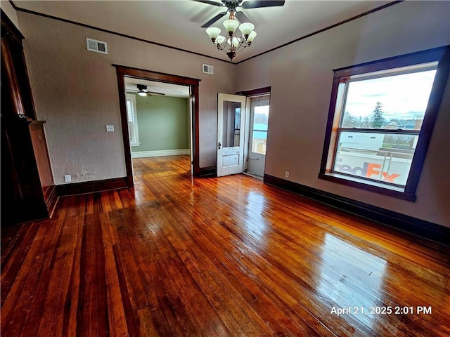23716 Washington St # 1/ # 2, Independence, WI 54747 - empty room with a ceiling fan, hardwood / wood-style floors, baseboards, and ornamental molding