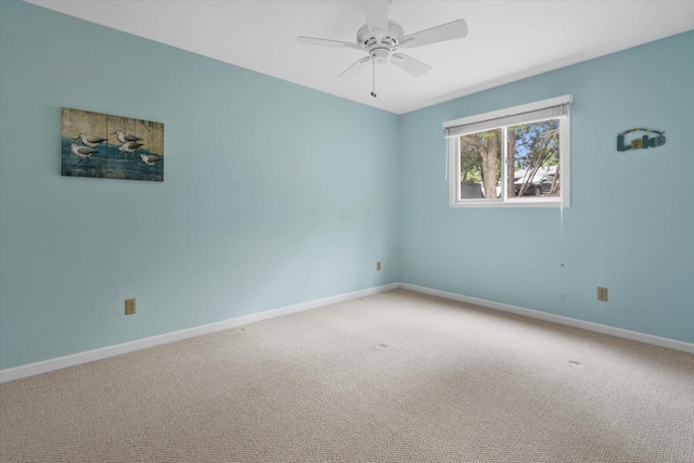 131 Lance Dr Unit 14, Twin Lakes, WI 53181 - empty room featuring carpet floors, baseboards, and a ceiling fan