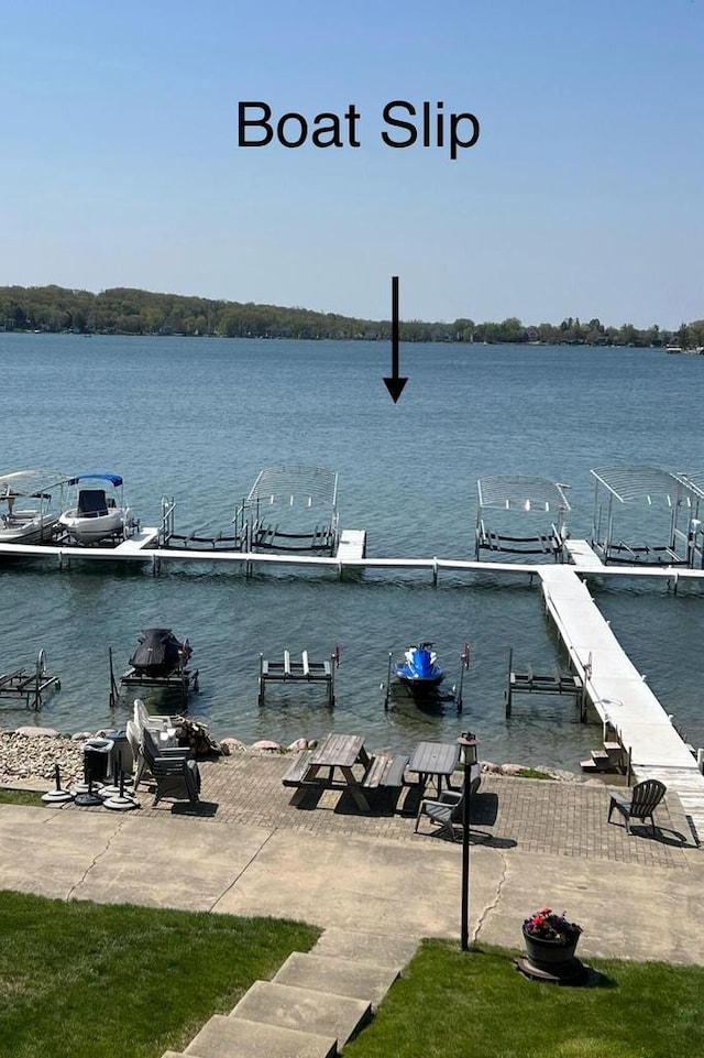 131 Lance Dr Unit 14, Twin Lakes, WI 53181 - dock featuring a water view