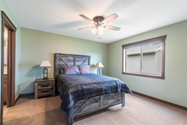 1996 Tucker Trl, Eau Claire, WI 54703 - bedroom with light carpet, baseboards, and ceiling fan