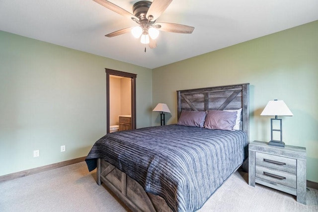 1996 Tucker Trl, Eau Claire, WI 54703 - carpeted bedroom with baseboards, ceiling fan, and connected bathroom