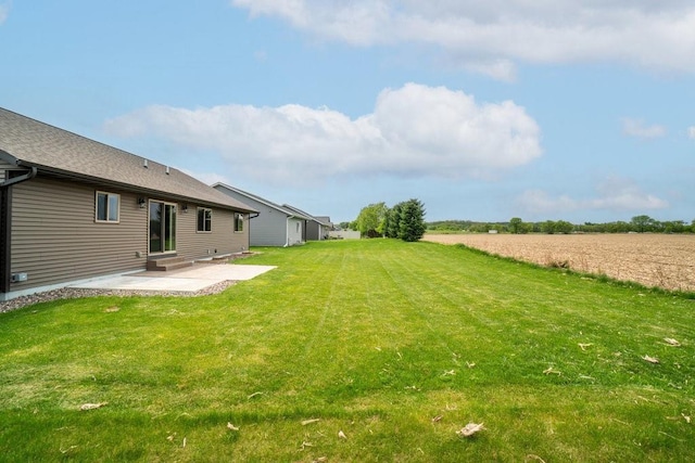 1996 Tucker Trl, Eau Claire, WI 54703 - view of grassy yard featuring a patio area and entry steps