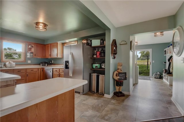 W4505 890th Ave, Baldwin, WI 54002 - kitchen with appliances with stainless steel finishes, open shelves, light countertops, and baseboards