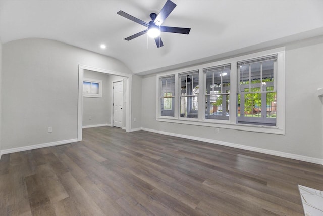 2976 N 40th St, Milwaukee, WI 53210 - unfurnished living room with a ceiling fan, baseboards, plenty of natural light, lofted ceiling, and wood finished floors