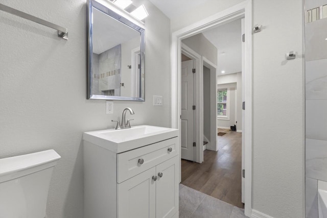 2976 N 40th St, Milwaukee, WI 53210 - full bath with vanity, toilet, a tub, and tile patterned floors
