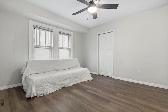2976 N 40th St, Milwaukee, WI 53210 - sitting room with baseboards, a ceiling fan, and dark wood finished floors