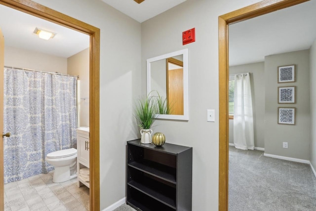 874 Xanadu Rd, Wisconsin Dells, WI 53965 - full bathroom with vanity, toilet, and baseboards