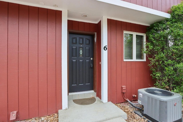874 Xanadu Rd, Wisconsin Dells, WI 53965 - doorway to property featuring central air condition unit